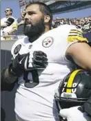  ??  ?? Steelers offensive lineman Alejandro Villanueva, a former Army Ranger, stands by himself during the national anthem Sunday at Soldier Field in Chicago.
