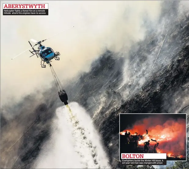  ??  ?? Helicopter fights a forest fire on a remote hillside where fire engines have no access Firefighte­rs tackle the Winter Hill blaze. A 22-year-old man was charged with arson