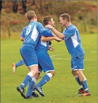  ?? 25_c05tarbert­10 ?? Celebratio­ns after Blair Mckay put Tarbert ahead.