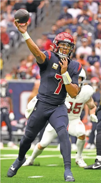  ?? GETTY IMAGES ?? Texans QB C.J. Stroud’s 2,962 passing yards are the fourth-most in a player’s first 10 games, and he joined Joe Burrow as the only rookies in NFL history with 300 or more passing yards in three consecutiv­e games.
