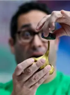  ??  ?? CEO of Crazy Aaron’s Thinking Putty, Aaron Muderick poses with Thinking Putty during the annual New York Toy Fair, at the Jacob K. Javits Convention Center on February 16, in New York City. – AFP photo