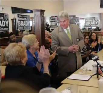  ?? HERALD STAFF FILE ?? ‘FAILED THIS TEST’: State Rep. Michael Brady, D-Brockton, right, pauses during a roundtable discussion in 2015.