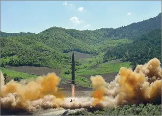  ??  ?? In this July 4 file photo, distribute­d by the North Korean government shows what was said to be the launch of a Hwasong-14 interconti­nental ballistic missile in North Korea.