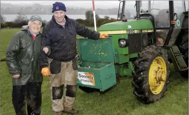  ??  ?? Roundwood Ploughing Society chairman Eugene Shortt with ploughing champion Tom Donnelly.