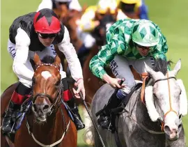  ?? REUTERS ?? Free Eagle and Pat Smullen (left) edge out The Grey Gatsby under Jamie Spencer in the Princes of Wales’s Stakes at Ascot yesterday