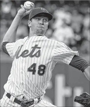  ?? AP PHOTO ?? New York Mets starter Jacob deGrom delivers a pitch.