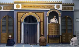  ??  ?? Muslims pray inside the first state-funded mosque in Athens. Photograph: Petros Giannakour­is/AP