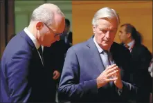  ?? FRANCOIS LENOIR / REUTERS ?? Michel Barnier (right), the EU’s chief Brexit negotiator, talks with Irish Foreign Minister Simon Coveney during the General Affairs Council in Luxembourg on Tuesday.