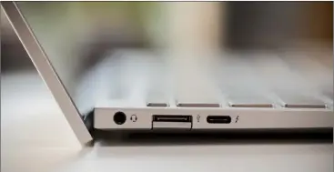  ??  ?? Surprising­ly, the HP has an AC smart pin slot for charging, rather than USB-C