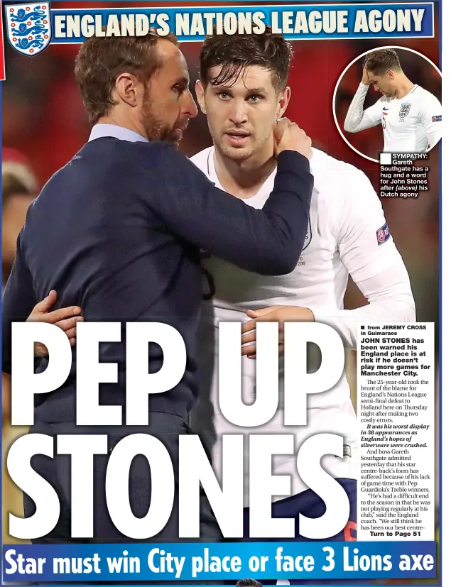  ??  ?? ■ SYMPATHY: Gareth Southgate has a hug and a word for John Stones after his Dutch agony