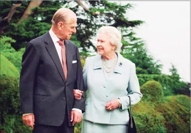  ?? Fiona Hanson/PA Wire / TNS ?? Queen Elizabeth II and the Duke of Edinburgh at Broadlands in Nov. 2007. The couple had a strong bond but were different in character and the Duke of Edinburgh never shied away from telling his wife exactly what was what. Prince Philip passed away on April 9 at age 99.