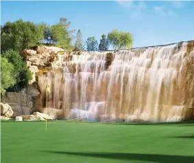  ??  ?? clockwise from left: The par-four 11th hole, with a view of the Wynn and Encore towers; Director of Golf Brian Hawthorne on the course with a caddie; the waterfall at the 18th hole.