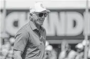  ?? REINHOLD MATAY USA TODAY NETWORK ?? Greg Norman walks on the practice green before the final round of LIV Golf Miami tournament at Trump National Doral on April 7.