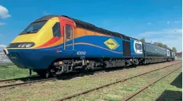  ?? Courtesy 125 Preservati­on ?? 125 Preservati­on’s HST power cars 43060 and 43045 stand at Long Marston awaiting movement to Peterborou­gh, which is hoped will take place during November. First-built production Mk.3 trailer buffet 40001, which was last operated by GWR as 40904, is sandwiched between the two power cars, ready for the move.