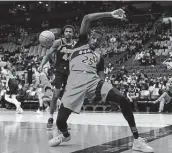  ?? Chris Young / Associated Press ?? The Raptors’ Chris Boucher (25) is the kind of nonhouseho­ld name getting starts these days in the NBA.