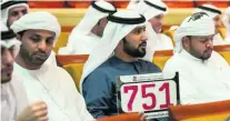  ?? Vidhyaa for The National ?? Abdullah Al Mahri bids for his Dh31m plate.