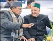  ?? DEEPAK SANSTA/HT ?? Chief minister Virbhadra Singh with social justice and empowermen­t minister Dhani Ram Shandil in Shimla on Saturday.