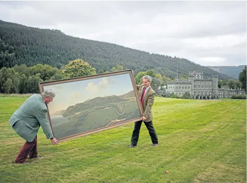  ??  ?? PANORAMIC VIEW: Bonhams staff with John Sanger’s Taymouth painting on the hillside above Taymouth Castle.