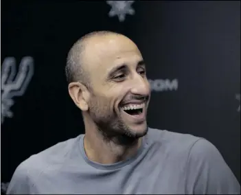  ?? AP PHOTO/ERIC GAY ?? Former San Antonio Spurs guard Manu Ginobili jokes with the media at the NBA basketball team’s practice facility, in 2018 in San Antonio.