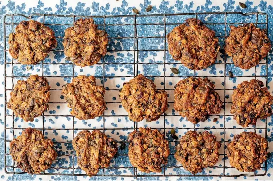  ?? NICOLA GALLOWAY ?? Oat and zucchini pantry cookies make the most of whatever ingredient­s you have to hand.