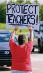  ?? Contributo­r file photo ?? Cy-Fair teachers, staff and parents protest COVID-19 teaching requiremen­ts.