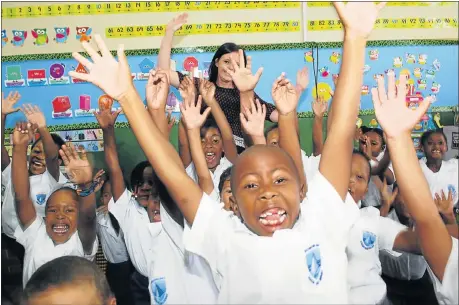  ?? Picture: BAZIL RAUBACH ?? RARING TO GO: Victoria Park Grey Primary School teacher Kirsty Kotze shares in the excitement of her new Grade 1 pupils