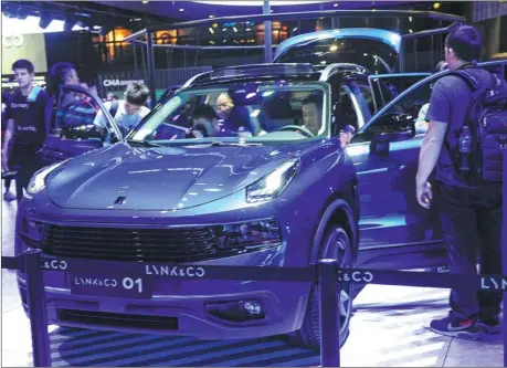  ?? HAI XIN / FOR CHINA DAILY ?? A Lynk & Co concept SUV is a highlight at this year’s Shanghai auto show.