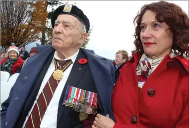  ?? Daily Courier file photo ?? Ed Dickins of Kelowna attended last month’s Remembranc­e Day service at the cenotaph in City Park with his daughter, Janice. Dickins is one of 19 British Columbians to receive the province’s Medal of Good Citizenshi­p this year.