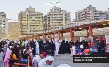  ??  ?? Visitors are seen during the 16th Sharjah Heritage Days festival.