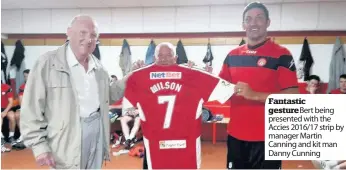  ??  ?? Fantastic gesture Bert being presented with the Accies 2016/17 strip by manager Martin Canning and kit man Danny Cunning