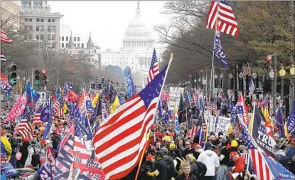  ?? LUIS M. ALVAREZ AP ?? With the U.S. Capitol in the background, supporters of President Donald Trump rally at Freedom Plaza on Saturday in Washington.