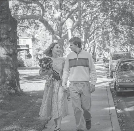  ?? A24 ?? Saoirse Ronan, left, and Lucas Hedges star in the near-perfect coming of age story Lady Bird.