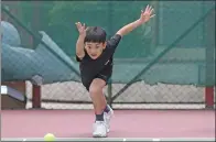  ?? PROVIDED TO CHINA DAILY ?? Left: Ball kids for the WTA Elite Trophy tournament were selected by event organizer Zhuhai Huafa Sports Operations Management Co, which staged tryouts in Hong Kong, Macao and Taipei. Right: Youngsters from the Macao Tennis Academy attend one of the...
