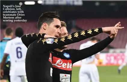  ??  ?? Napoli's Jose Callejon, left, celebrates with teammate Dries Mertens after scoring yesterday