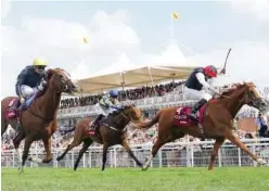  ?? ?? ↑ Kyprios, ridden by Ryan Moore, wins the Goodwood Cup on Tuesday.