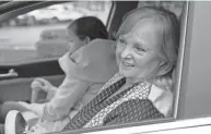  ?? ?? Cindy Cowles, of Cardington, waits in the drop-off line with her granddaugh­ter Savannah Keplar at Bridgeway Academy in East Columbus on Dec. 15. Cowles also picks up her granddaugh­ter at the end of the school day. They drive about 270 miles each day for Savannah to attend the school.