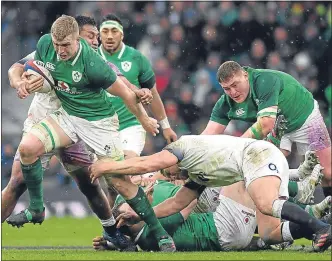  ??  ?? Dan Leavy breaks away against England at Twickenham