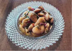  ?? ?? White Bean Salad in a marinade of red wine vinegar, red onion and cilantro.