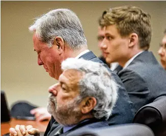  ?? ALYSSA POINTER / ALYSSA.POINTER@AJC.COM ?? Ex-DeKalb County police Officer Robert “Chip” Olsen becomes emotional at Friday’s sentencing in front of Judge LaTisha Dear Jackson at the DeKalb County Courthouse.