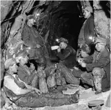  ?? ?? Break time: Cornish tin miners in 1933