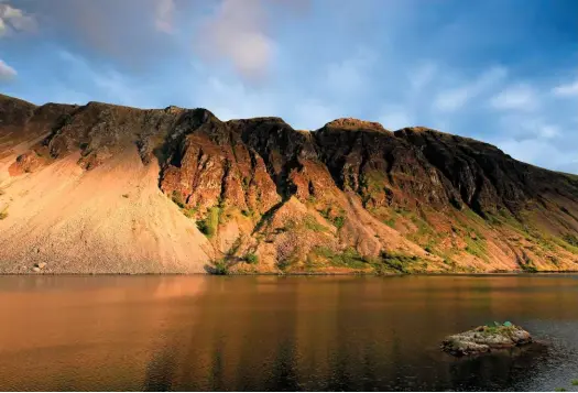  ??  ?? The Wasdale Screes offer no resistance to the depths of Wast Water.