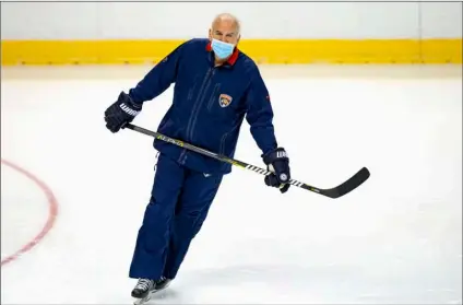  ?? David Santiago/Miami Herald via AP ?? Florida Panthers head coach Joel Quennevill­e skates during the first practice of training camp in preparatio­n for the 2020-21 NHL season at the BB&T Center on Jan. 4 in Sunrise.