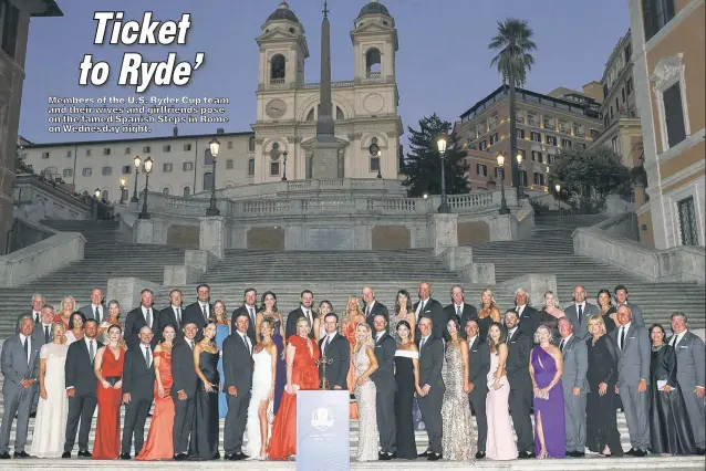  ?? ?? Members of the U.S. Ryder Cup team and their wives and girlfriend­s pose on the famed Spanish Steps in Rome on Wednesday night.