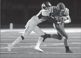  ?? BEA AHBECK/NEWS-SENTINEL ?? Lodi's Isaac Bishop is tackled by Edison's Artie Taylor in Stockton on Sept. 14.