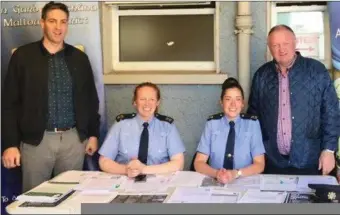  ??  ?? Garda Katie Burke (second right), with Detective Sean Buckley, Garda Catherine Canty and Seamus O’Keeffe (far right), general manager Kanturk Marts, at the informatio­n stand at Kanturk Marts.