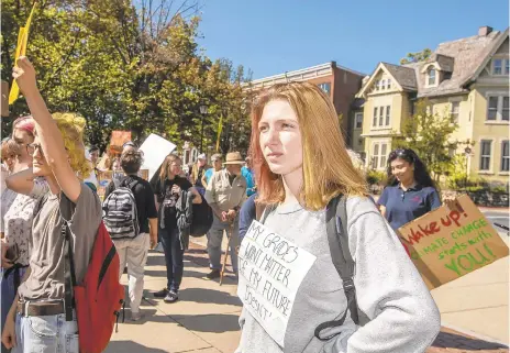  ?? APRIL GAMIZ/THE MORNING CALL ?? Lehigh Valley Charter High School for the Arts student Madison Bold participat­es in the Climate Strike on Friday at Payrow Plaza in Bethlehem. Students from Lehigh University and Lehigh Valley Charter High School for the Arts were among the protesters.
