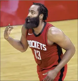  ?? Carmen Mandato Associated Press ?? THE NETS have James Harden, above, to go with Kevin Durant and Kyrie Irving, but will that make them challenger­s to the Lakers or just a hot Eastern mess?