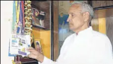  ?? HT PHOTO ?? Yashwant Singh with medals won by his grandson Anish Bhanwala at his residence in Karnal on Friday.