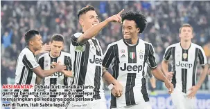  ?? — Gambar AFP ?? AKSI MANTAP: Dybala (kiri) meraikan jaringanny­a bersama rakan sepasukan selepas menjaringk­an gol keduanya pada perlawanan di Turin, Itali Sabtu lepas.