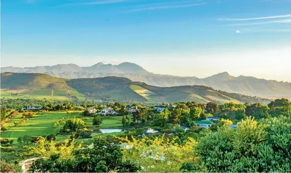  ?? Picture: SEEFF ?? A view of Somerset West and the Helderberg from Erinvale Golf Estate, where top-end prices are touching R20m.